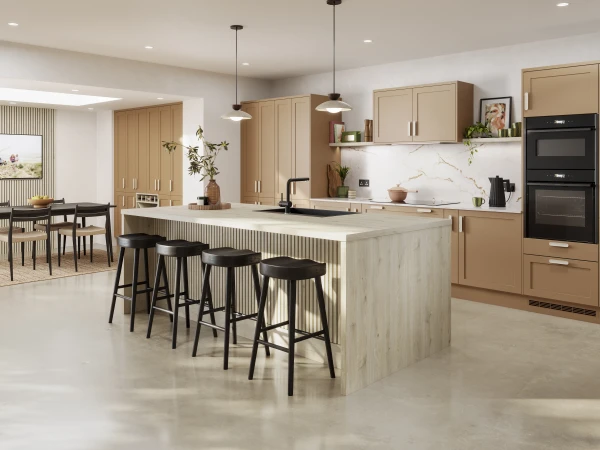 Modern kitchen with light wood cabinetry, white stone countertops, black bar stools, and open-plan dining area.