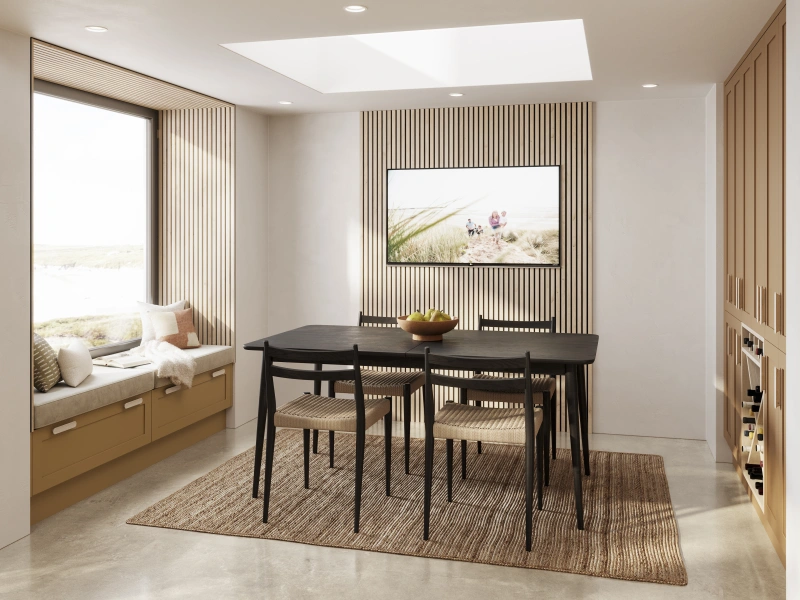 Light-filled modern room with wooden cabinetry, black dining table, window seat, and vertical wood-slat accent wall.