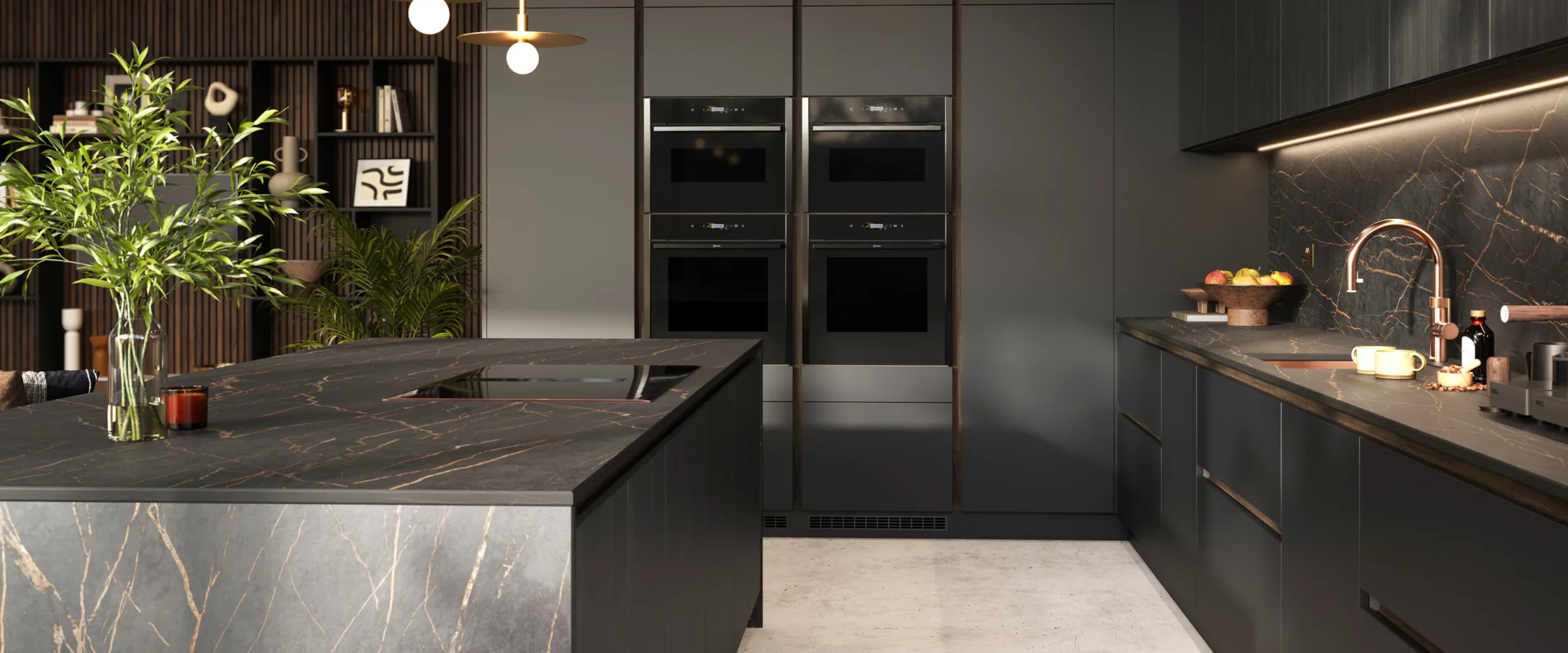 Modern luxury kitchen with dark grey cabinetry and black marble countertops featuring gold veining, built-in double wall ovens, pendant lighting, an island with a waterfall edge, stainless steel sink with rose gold tap, decorative plants in glass vase, and open shelving with vertical ribbed wall panelling in the background.
