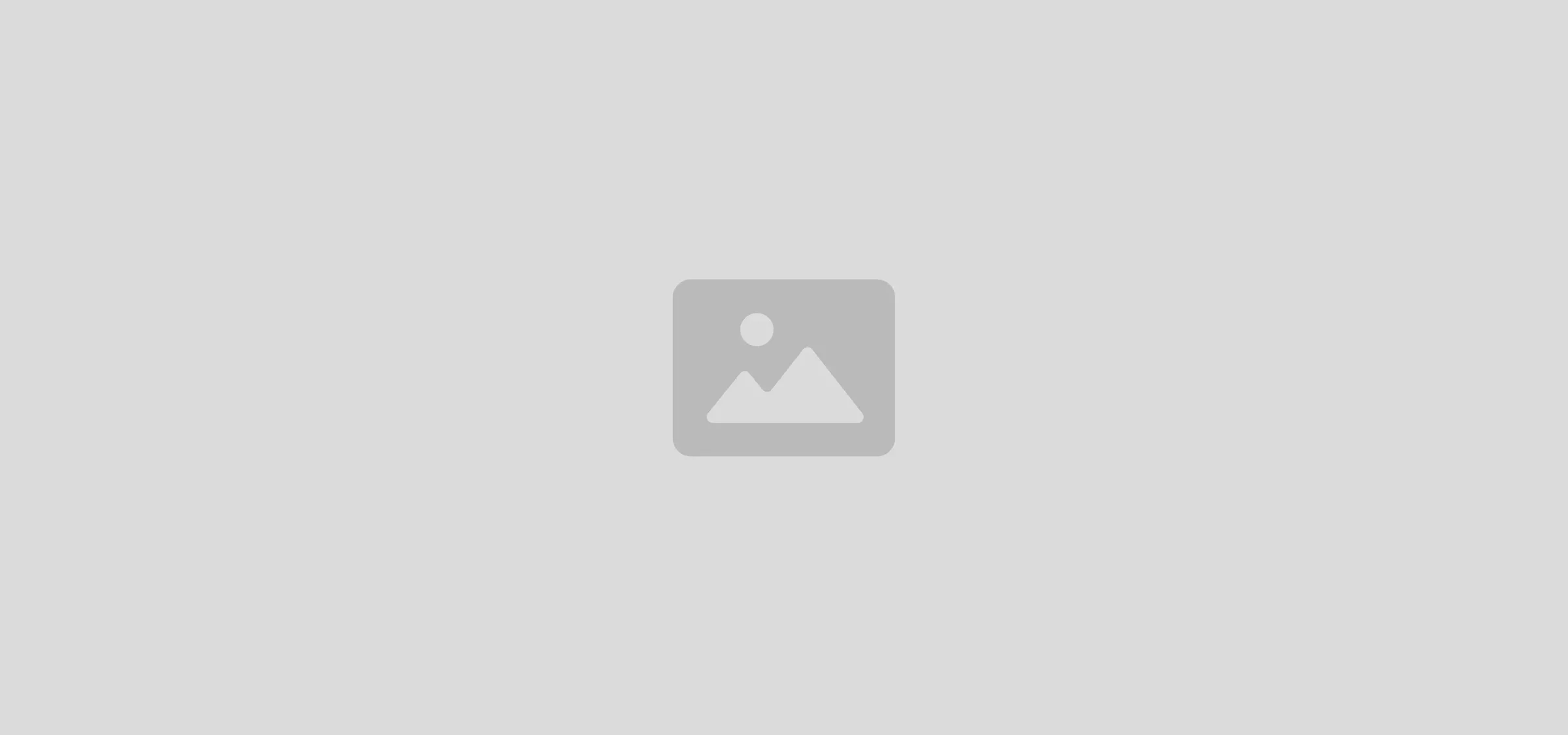 Generic placeholder icon featuring mountains and sun on a light grey background
